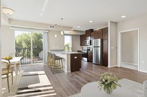 Hastings apartment for rent - Living Room With Kitchen at The Quill 55+ Apartments, Minnesota