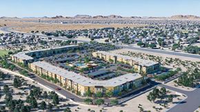 San Tan Valley apartment for rent - A large, modern building complex is surrounded by a parking lot and a residential neighborhood.