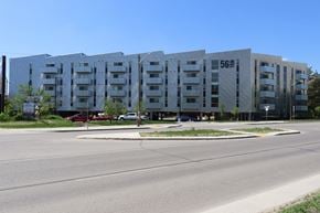 Winnipeg apartment for rent - a large building with a street in front of it