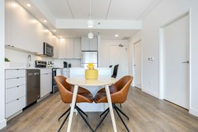 Winnipeg apartment for rent - a kitchen and dining room with a table and chairs