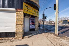 Winnipeg apartment for rent - A convenience store with a sign that says "Pop & Pick".