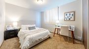 Minneapolis apartment for rent - a bedroom with a bed and a desk