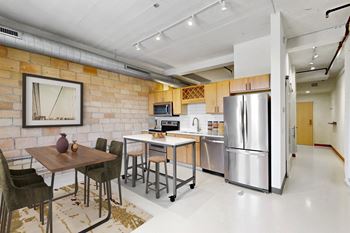 Exposed original brick and timber