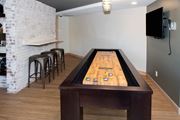 Eagan apartment for rent - Shuffleboard table and tv at Aspenwoods Apartments, Eagan