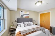 Inver Grove Heights apartment for rent - a bedroom with a large bed and a window