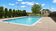 Eagan apartment for rent - A small pool surrounded by a black fence.