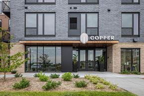 Rosemount apartment for rent - A building with a sign that says "COPPER" on it.