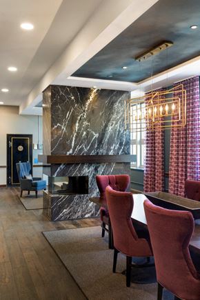 Saint Paul apartment for rent - Clubhouse with TV, Fireplace, and Kitchen at Custom House, St. Paul, 55101