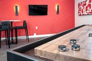 Eagan apartment for rent - shuffleboard table and gaming at Eagan Place Apartments, Eagan, MN