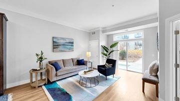 Lakeville apartment for rent - A living room with a couch, chair, and a painting on the wall.