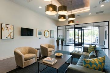 St Louis Park apartment for rent - a living room with couches and chairs and a coffee table