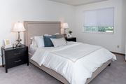 Inver Grove Heights apartment for rent - a bedroom with a bed and two nightstands