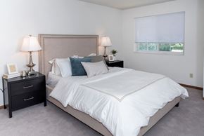 Inver Grove Heights apartment for rent - a bedroom with a bed and two nightstands