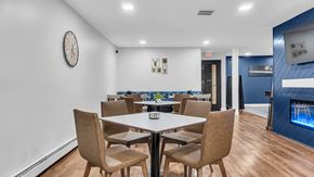 Roseville apartment for rent - Community Room With Firepit at Hillsborough Apartments, Roseville, 55113