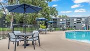 Roseville apartment for rent - Poolside Shaded Lounge at Hillsborough Apartments, Roseville, Minnesota
