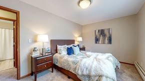 New Brighton apartment for rent - a bedroom with a bed and two night stands