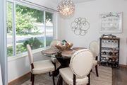 Eden Prairie apartment for rent - a dining room with a table and chairs and a large window