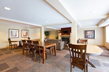 Living room with a dining table
