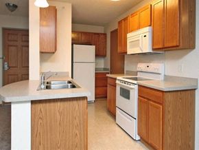 St. Paul apartment for rent - Kitchen with Wooden Cabinets at Joseph's Pointe at Upper Landing Apartments, St. Paul, 55102