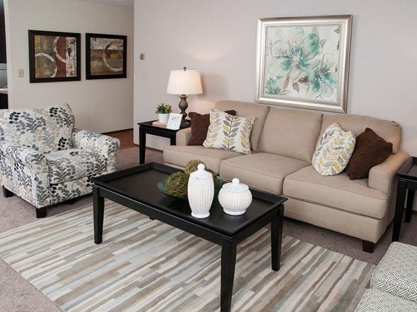 Saint Paul apartment for rent - Living room with sofa and center table at Terra Pointe Apartments, Saint Paul, 55119