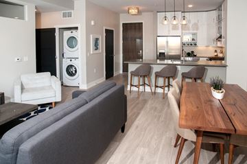 Saint Paul apartment for rent - a living room and dining room with a couch and a table
