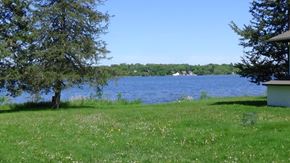 Medicine Lake apartment for rent - a view of the lake from the yard of a house