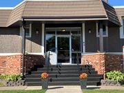 Brooklyn Park apartment for rent - the front of a building with steps and a porch