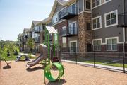 Prior Lake apartment for rent - Pike Lake Marsh Apartments Exterior Playground for kids