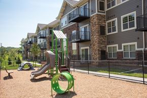 Prior Lake apartment for rent - Pike Lake Marsh Apartments Exterior Playground for kids