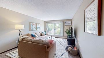 Shoreview apartment for rent - a living room with a couch and a tv