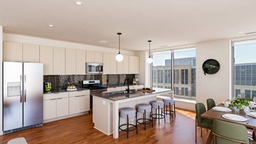 St. Paul apartment for rent - A modern kitchen with a dining table and chairs.