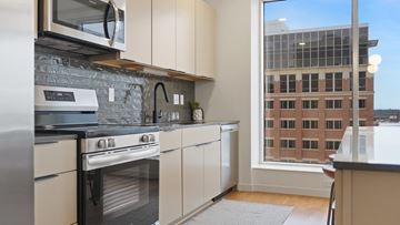 St. Paul apartment for rent - A kitchen with a stove, oven, and microwave.