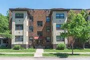 Minneapolis apartment for rent - an apartment building with a tree in front of it