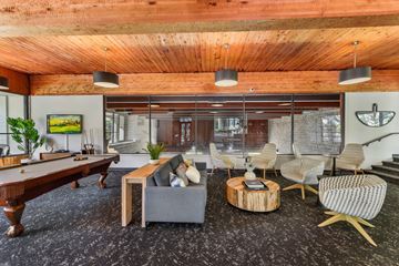 Bloomington apartment for rent - a living room with a pool table and a couch