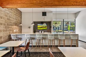 Bloomington apartment for rent - Eat-In Table With High Chairs In Clubhouse at The Tarnhill, Bloomington, 55437