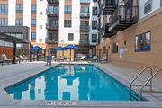 New Brighton apartment for rent - Pool With Relaxing Chairs at The Exchange Apartments, New Brighton, MN