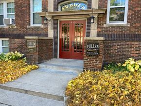 Minneapolis apartment for rent - a brick building with a red door
