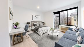Saint Paul apartment for rent - A well-lit bedroom at The Hill Apartments, Saint Paul, MN, 55102