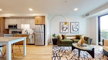 St. Paul apartment for rent - a living room with a couch and a table