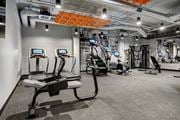 South St. Paul apartment for rent - a gym with treadmills and other exercise equipment in a building