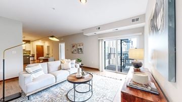 South St. Paul apartment for rent - A living room with a white sofa and a coffee table.