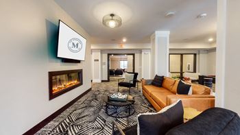Clubroom with tv and fireplace