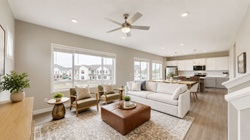 Lakeville townhouse for rent - A living room with a white couch and a brown coffee table.