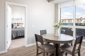 Waconia apartment for rent - A dining room with a round table and chairs.