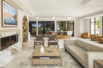 Upscale lobby with coffee bar, fireplace, and co-working space