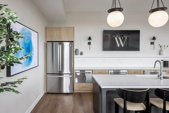 Sky lounge with large warming kitchen, fireplace, seating areas, tv's, fire pits and panoramic lake views