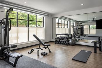 Expansive 24 hour fitness studio with sauna & cold plunge