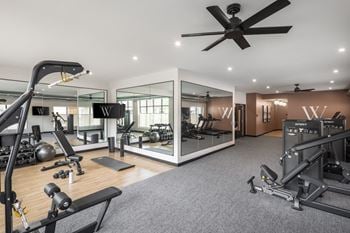 Expansive 24 hour fitness studio with sauna & cold plunge