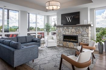 Sky lounge with large warming kitchen, fireplace, seating areas, tv's, fire pits and panoramic lake views