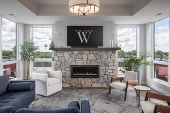 Sky lounge with large warming kitchen, fireplace, seating areas, tv's, fire pits and panoramic lake views